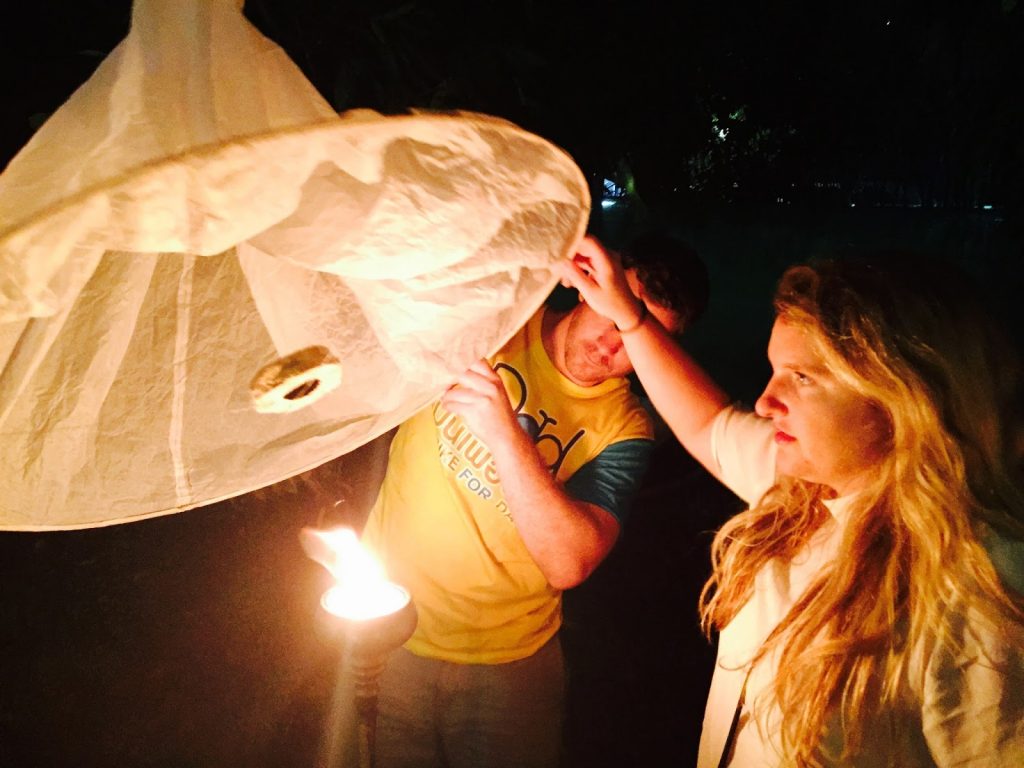 lighting the lantern at Yee Peng Lantern Festival