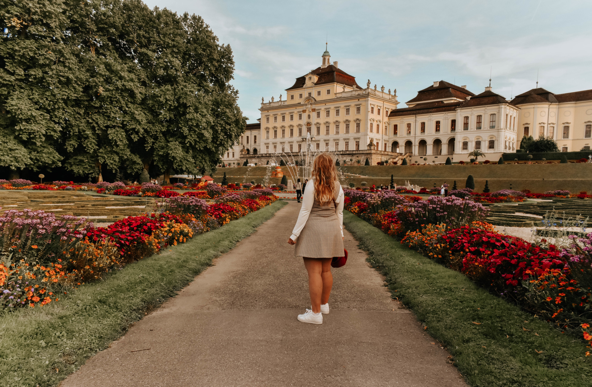 breathtaking Ludwigsburg Palace with blooming colorful flowers